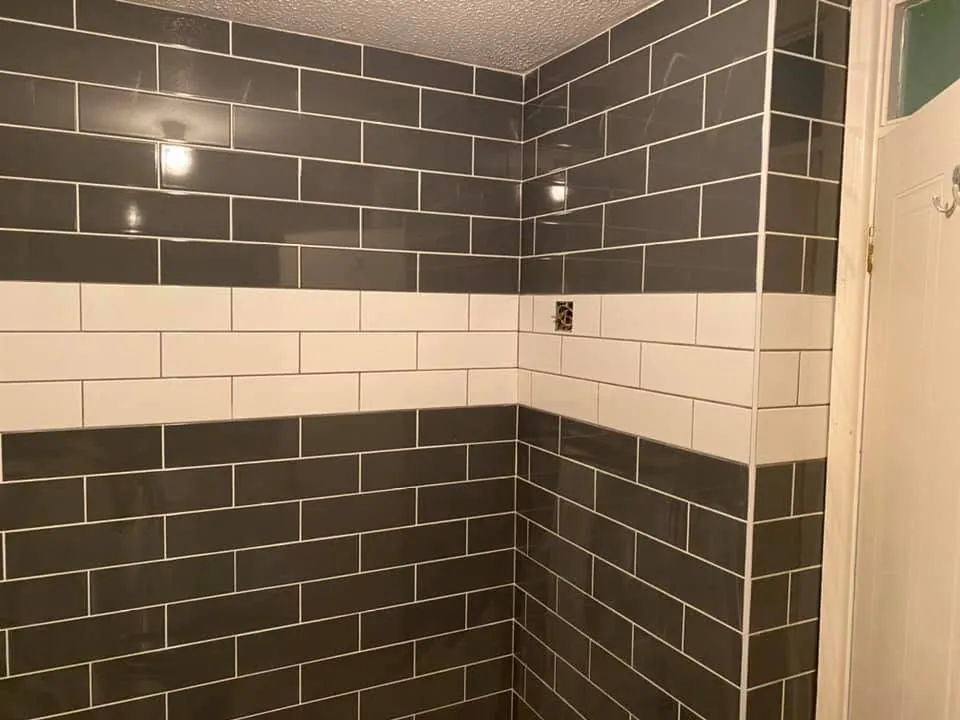 Wall tiling by Space B Tiling: grey and white metro wall tiles