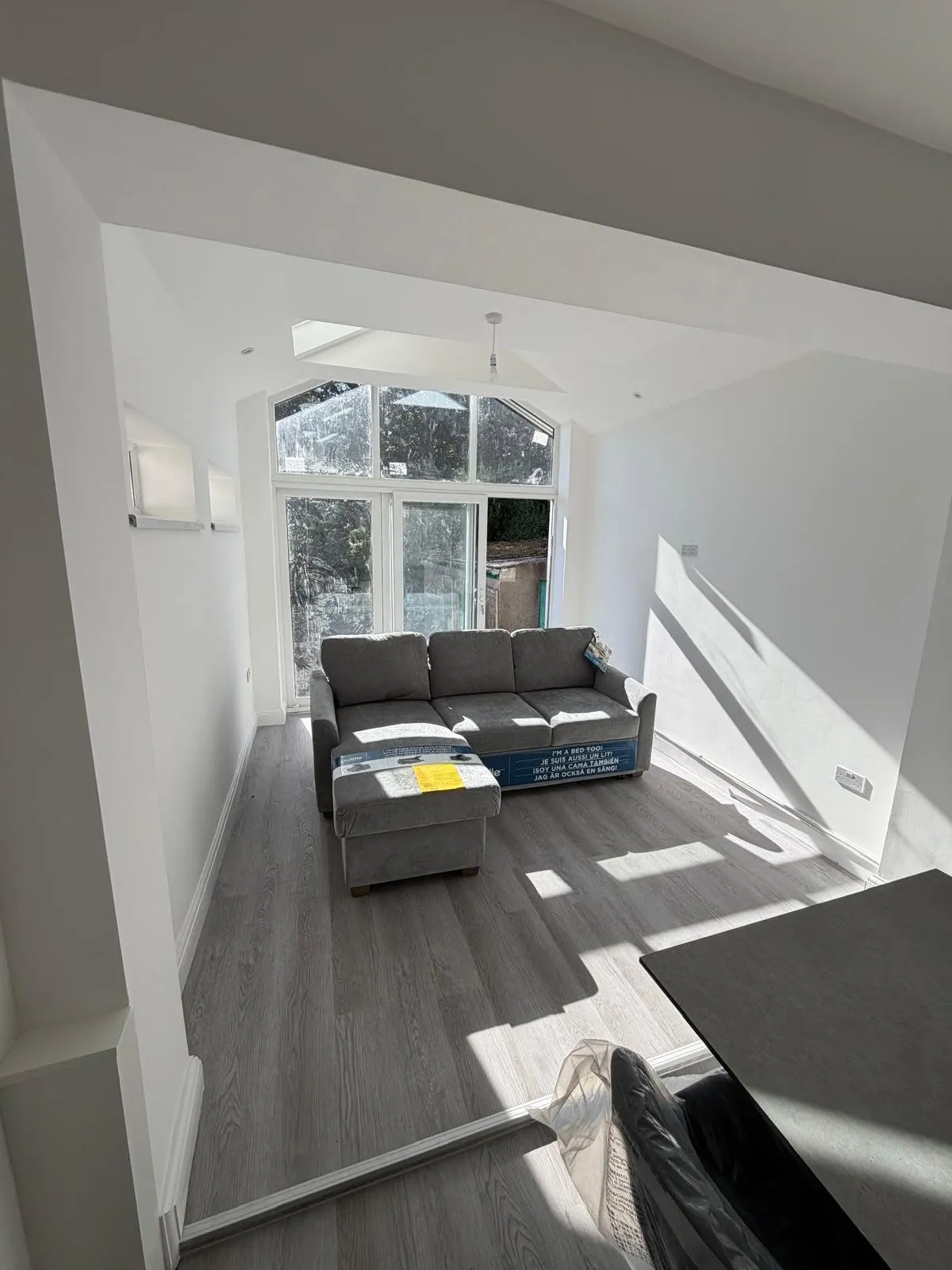 Painting by Space B Tiling: bright white painted extension living area
