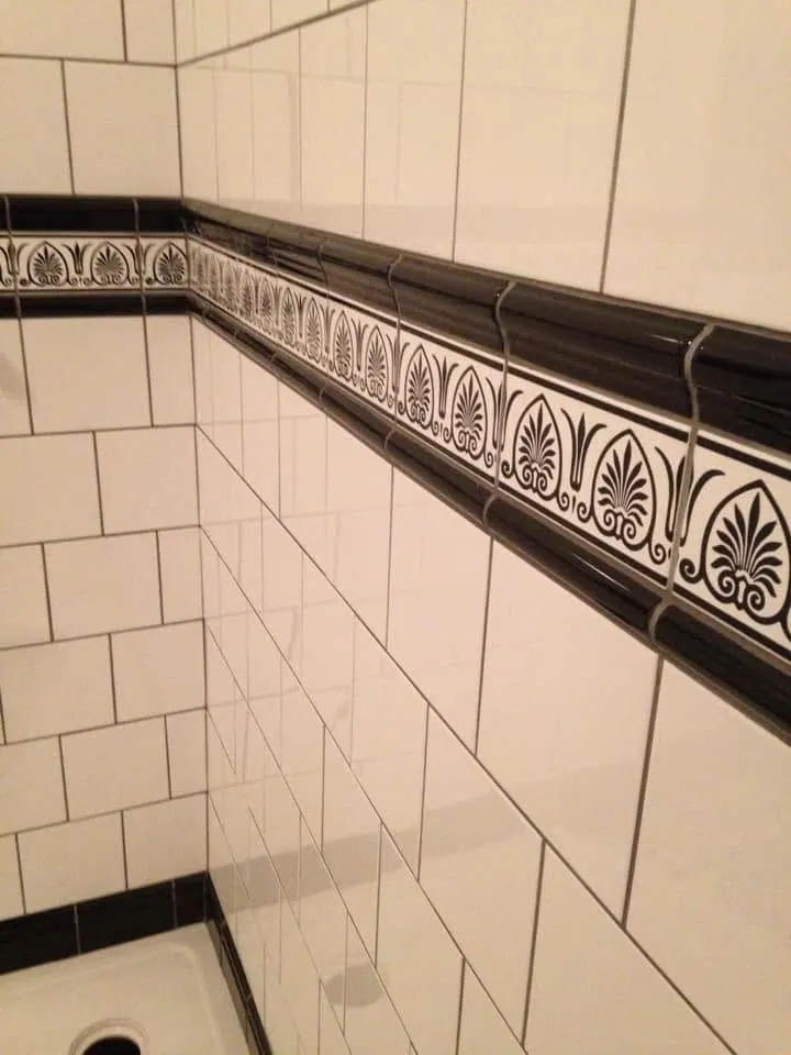 Wall tiling by Space B Tiling: white wall tiles with decorative black border
