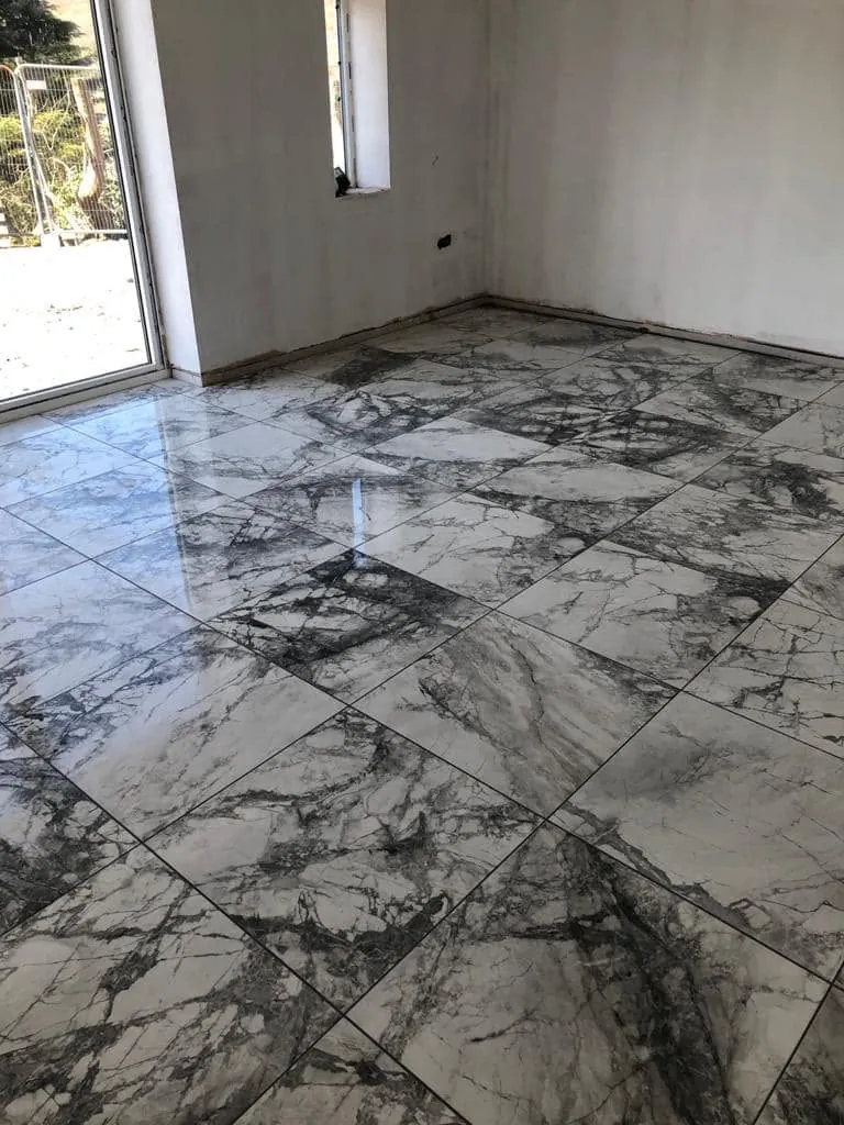 Floor tiling by Space B Tiling: polished marble-effect floor tiles